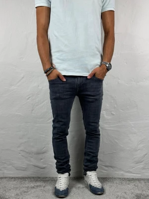 Nudie jeans  - Ett par riktigt snygga jeans från Nudie i storlek W28 L30 i modellen Tight Long John