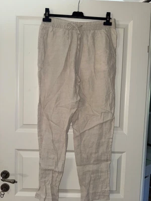 Linne byxor  - Linne byxor från H&M, nästa helt oanvända. 