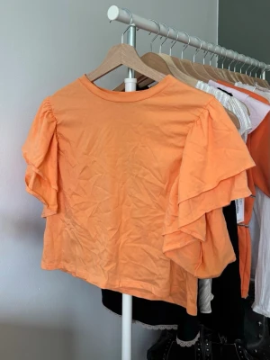 Volangtopp - Korall orange volangtopp