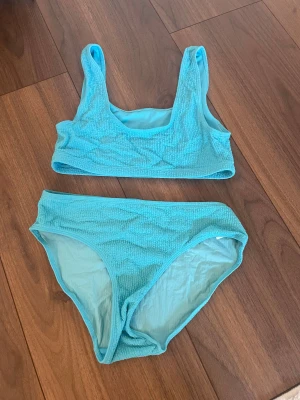 Bikini - Säljer denna fina bikini ifrån Lindex, den är i nytt skick! Den är mer turkos än blå!💕