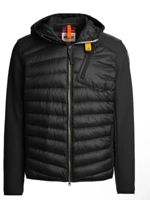Svart pufferjacka från Parajumpers - Stilren svart pufferjacka från Parajumpers med huva, quiltad front och ärmar i kontrasterande material. Jackan har dragkedja, bröstficka med gul detalj och logga på ärmen. Perfekt för kalla dagar och snygg till streetwear. 