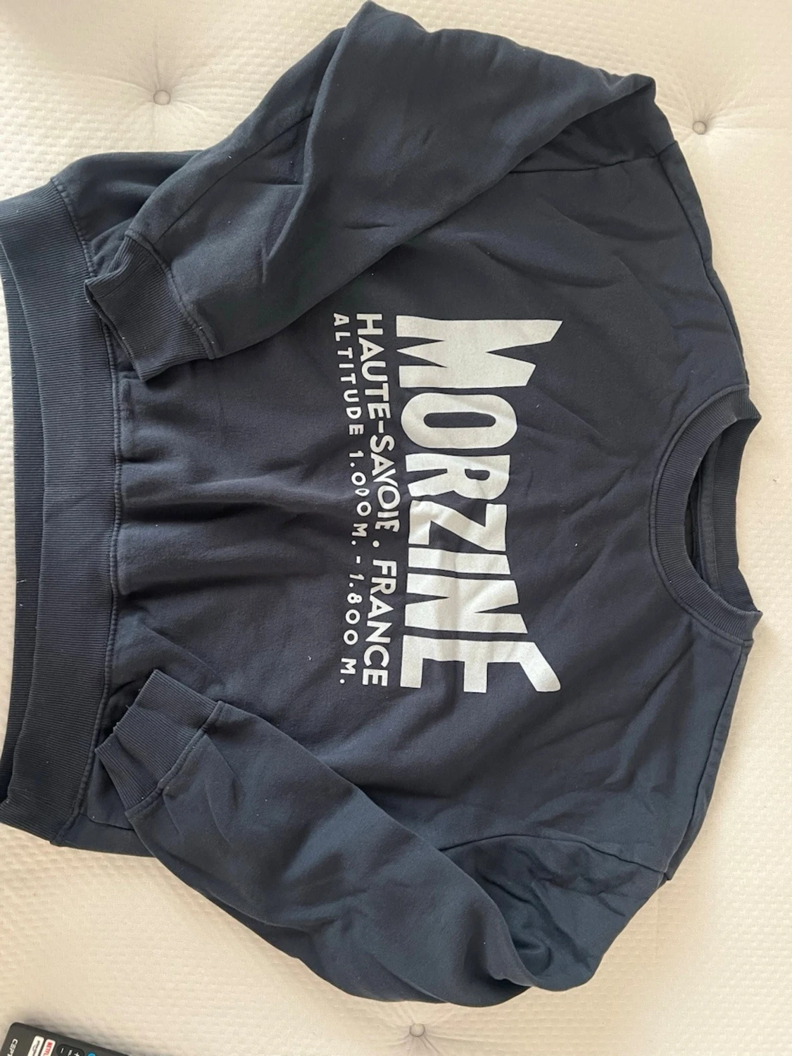 Svart sweatshirt med Morzine-tryck