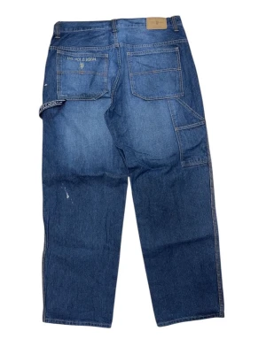 Baggy jeans - US polo assn baggy jeans W36 [Ytterbenslängd 110cm] [Innerbenslängd 82cm] [Midja 46cm] [Benöppning 25cm]