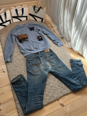 Ljus blå långärmad tröja från Wood Wood  - Wood wood sweater som tyvär inte passar.               i riktigt bra  skick med den klassiska loggan Priset är inte hugget i sten.    Hör av dig vid frågor✌️                                   