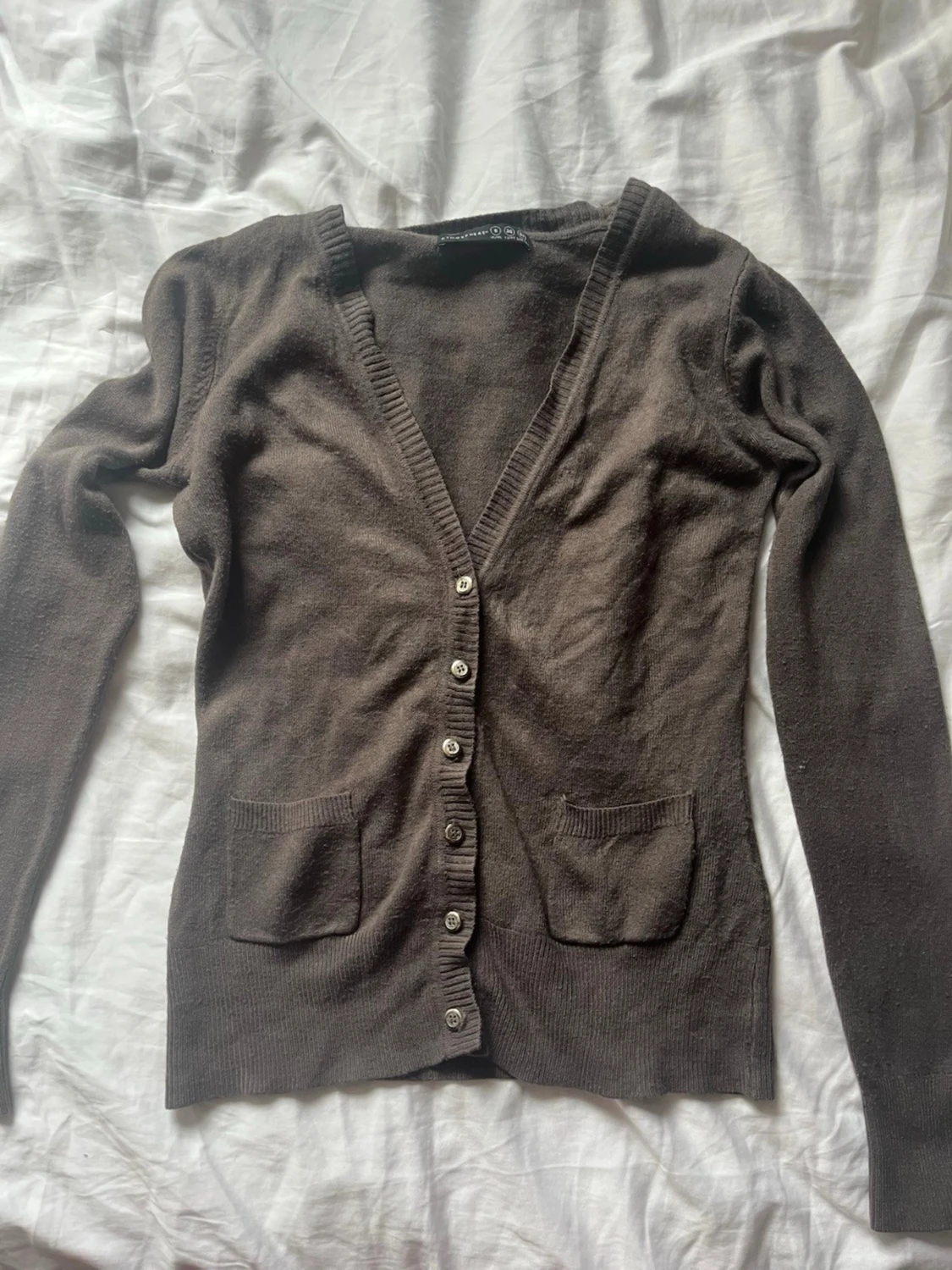 Brun kofta med knappar och fickor - 1