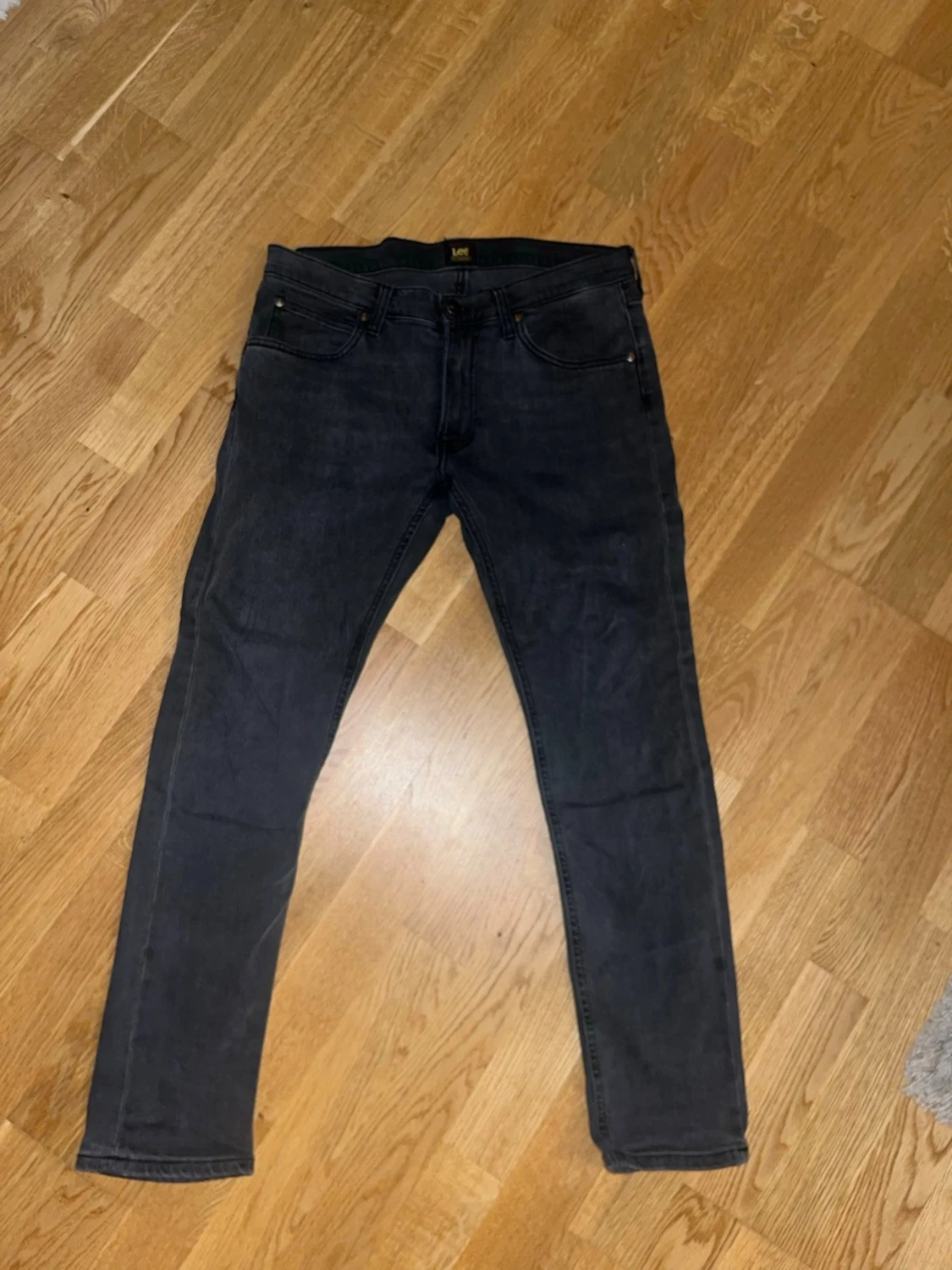 Svarta slim fit jeans från Lee W32 L30