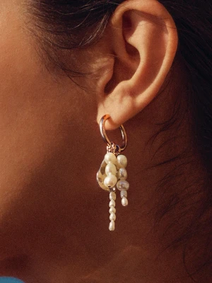 Örhängen - Handgjord örhänge i rostfritt stål och söt vattens pärlor. 