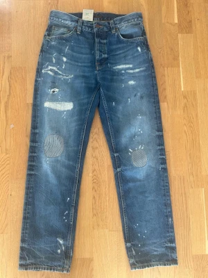 Nudie rad Rufus  - Ett par skit fetta och helt nya aldrig använda nudie rad Rufus i strl 29/30 som har nypris på en bit över 2000+