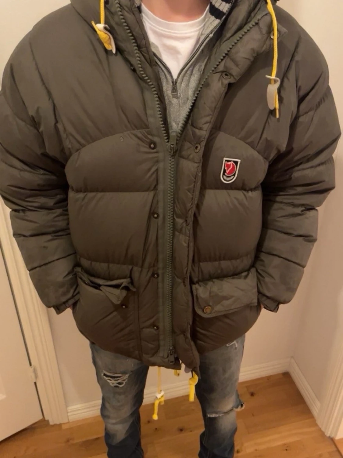 Grön dunjacka från Fjällräven