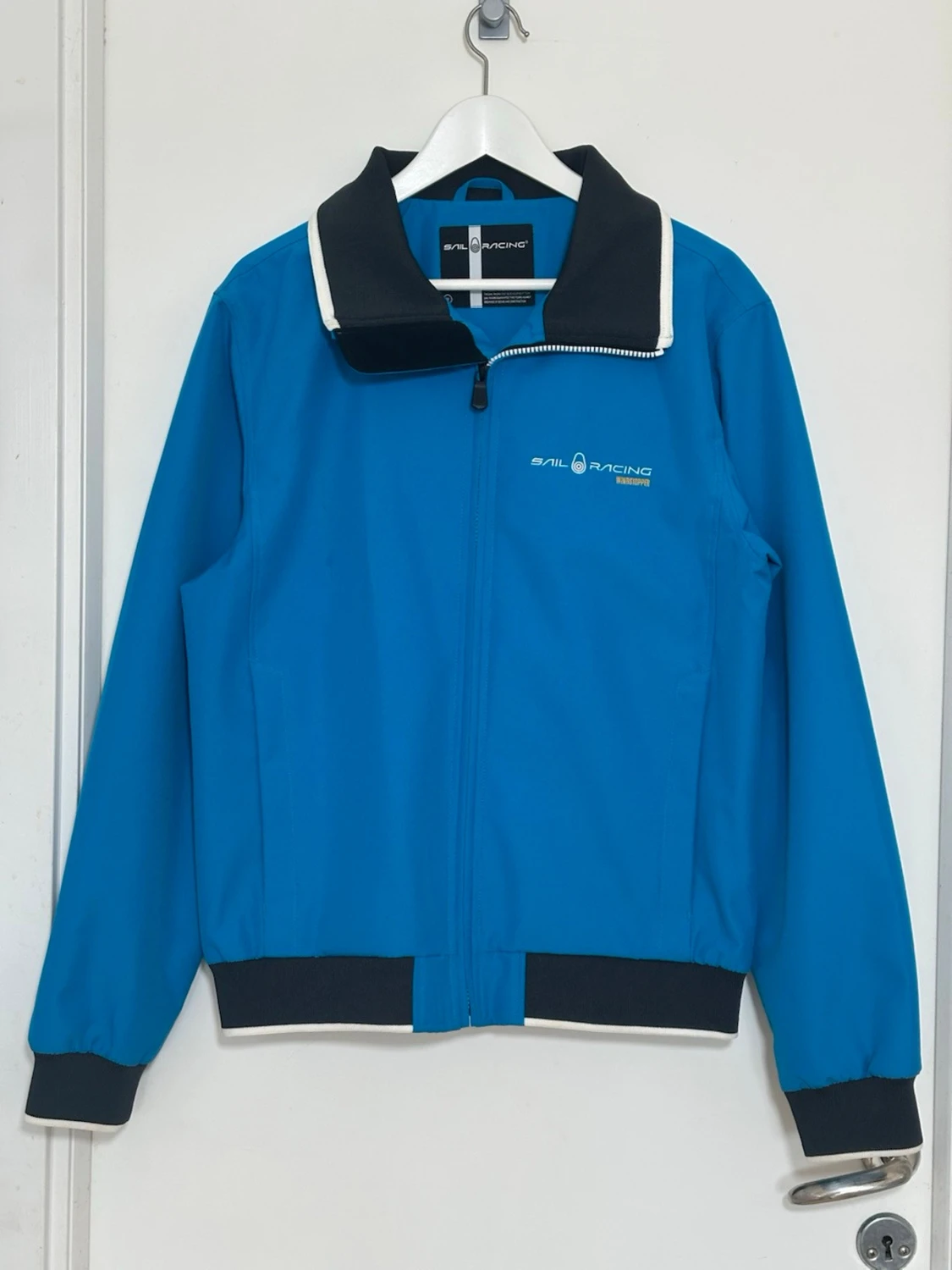 Blå vindjacka från Sail Racing
