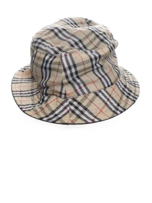 Rutig bucket hat  - ”Burberry” inspererad hat Säljer en klassisk bucket hat i det ikoniska rutiga mönstret. Hatten är beige med svarta, vita och röda ränder och är tillverkad i bomull. Perfekt accessoar för att lyfta din outfit med en tidlös touch.