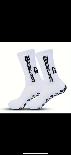 Benskydd + 1 strumpor - Benskydd svarta xs + ett par strumpor