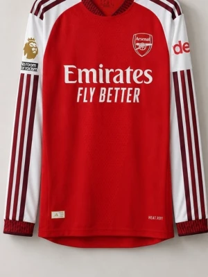 Arsenal nya hemma tröja i spelar version !  långärmad matchtröja Rice 41 - Skaffa den nya hemma tröjan i spelar version. Långärmad Arsenal matchtröja i rött och vitt med Deklan Rice och nummer 41 på ryggen. Tröjan har klubbmärke och sponsortryck framtill, samt klassiska Adidas-detaljer på ärmarna. Tillverkad i lätt och ventilerande funktionsmaterial, perfekt för fotbollsträning eller match.