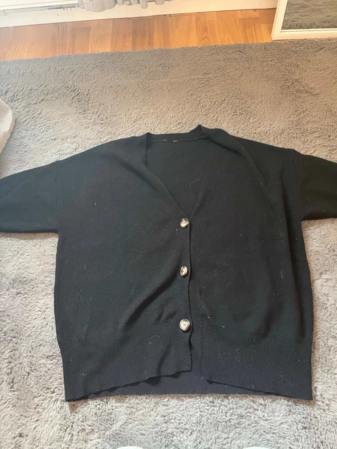 Svart kortärmad kofta 