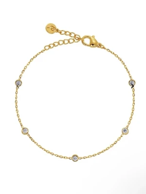 Petite Bracelet Gold  - Snyggt och tunt armband i guldfärg med små gnistrande stenar jämnt fördelade längs kedjan. Armbandet har en justerbar kedja och karbinlås. Perfekt för dig som gillar minimalistisk och elegant stil. Den är ny köpt och har ask med sig. Kostar 349kr.