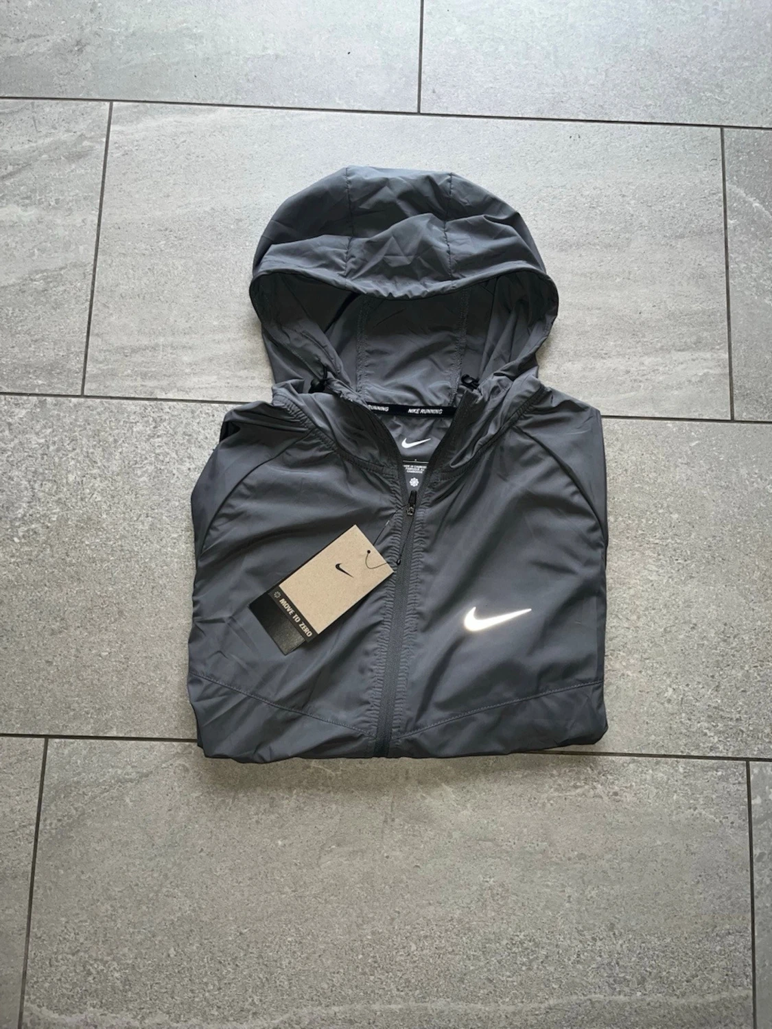 Grå nike runner vindjacka