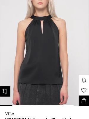  halterneck topp i satin - Använd 1 gång. Nypris 400kr