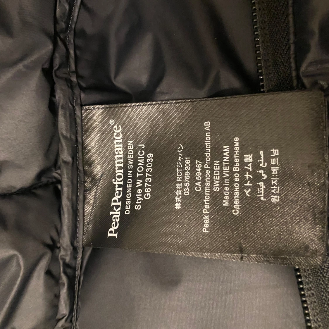 Svart dunjacka från Peak Performance - 92