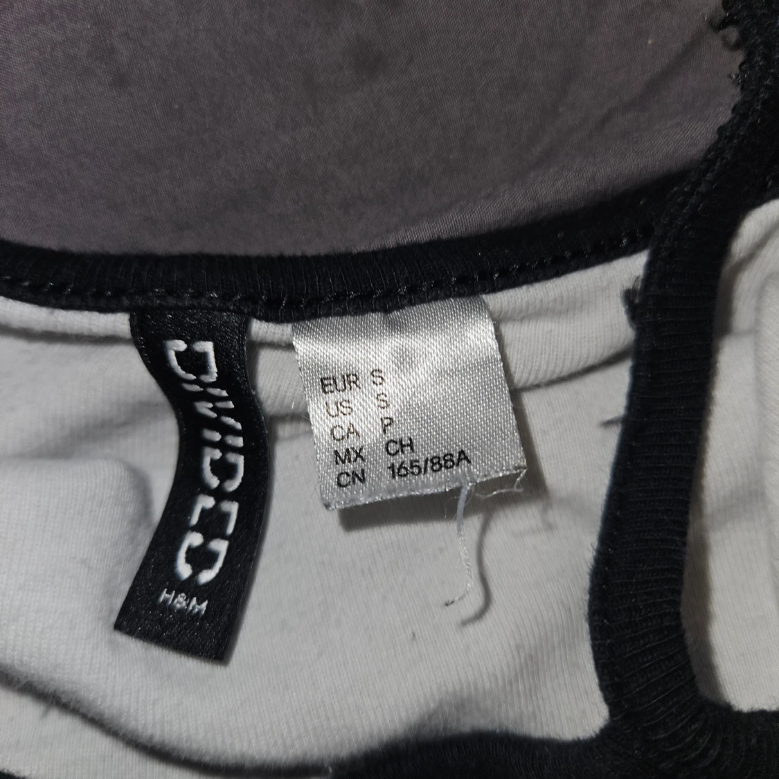 Vit och svart linne från Divided - 90