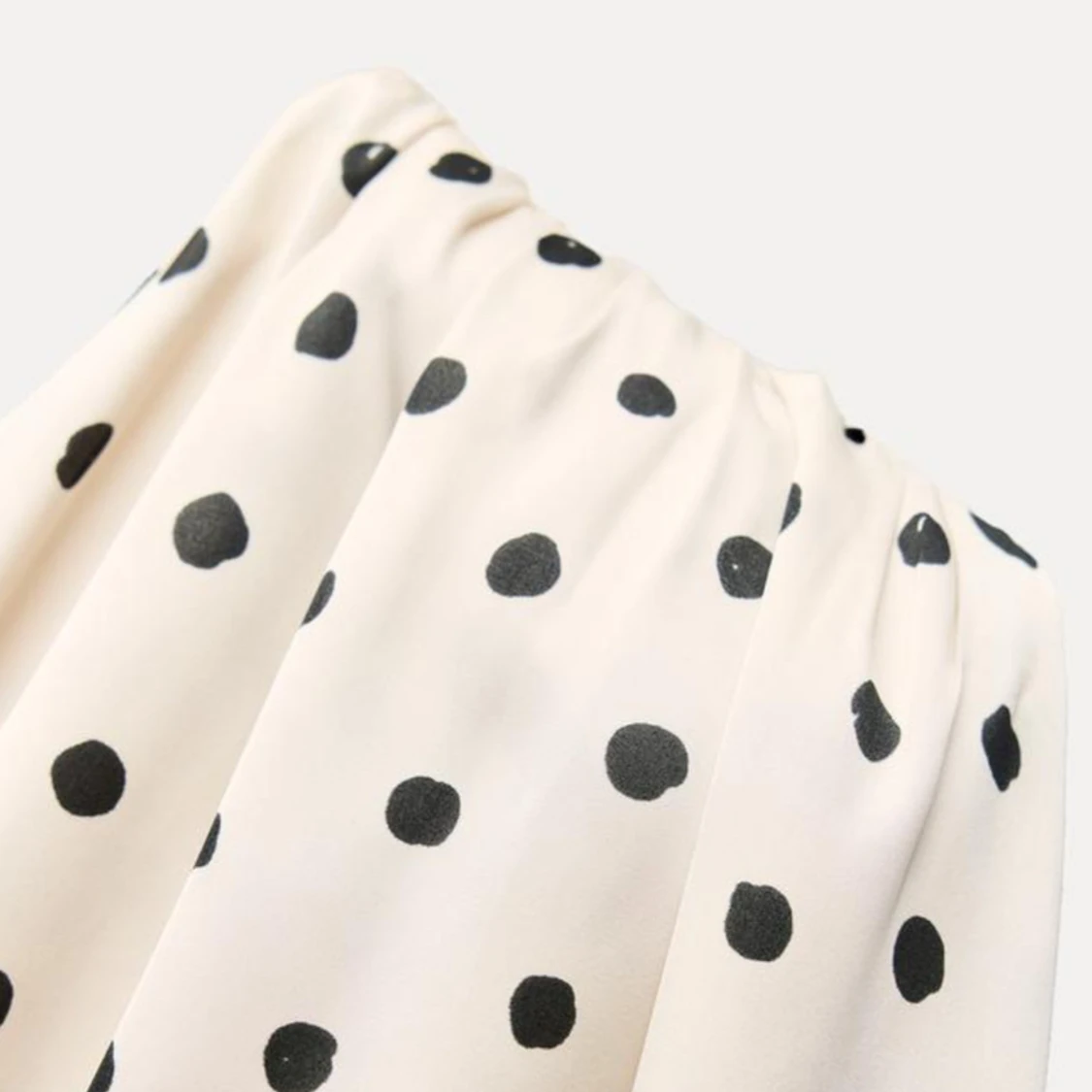 Prickig oneshoulder-topp - 91