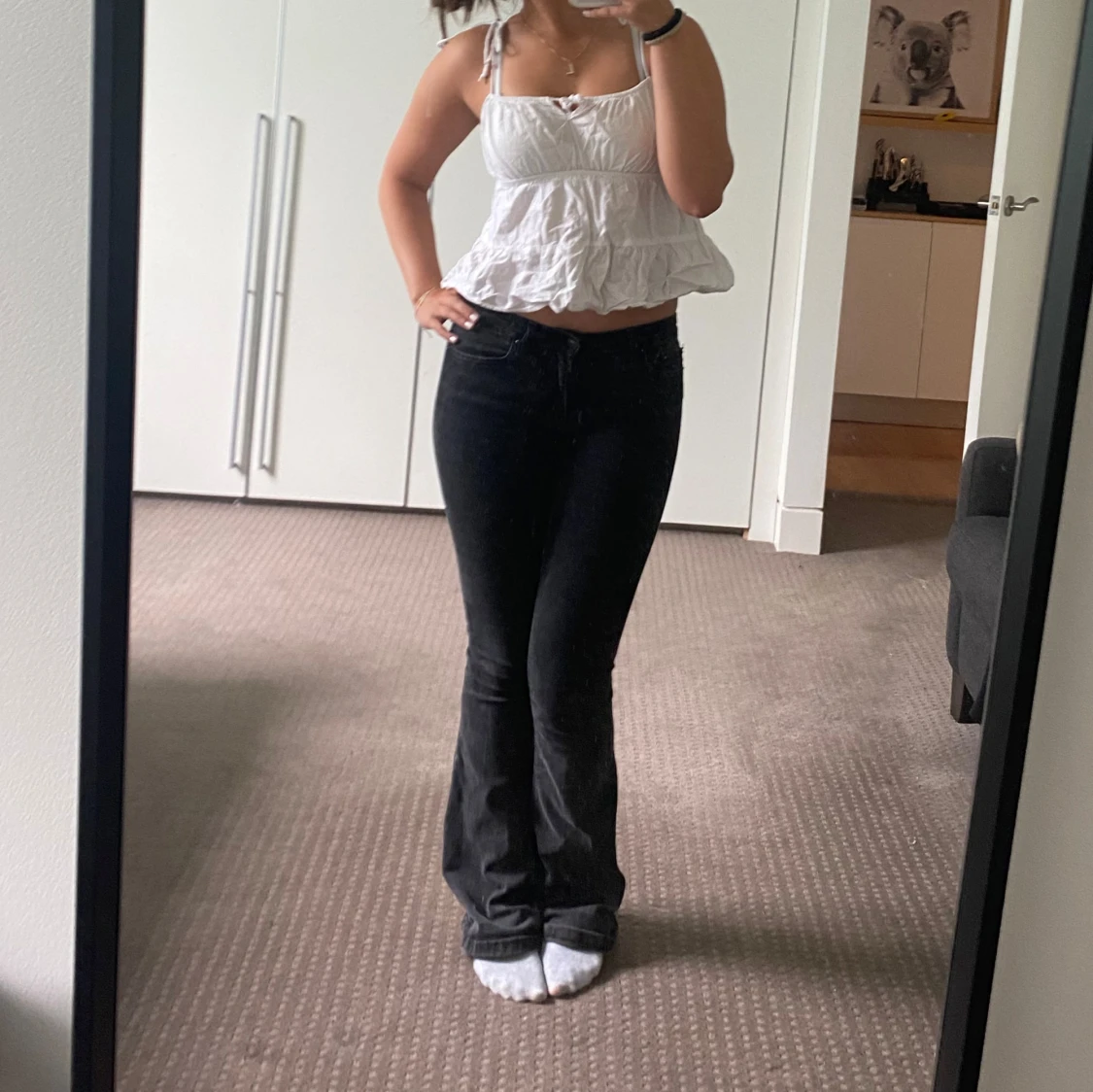 Vit ärmlös topp med volang - 90