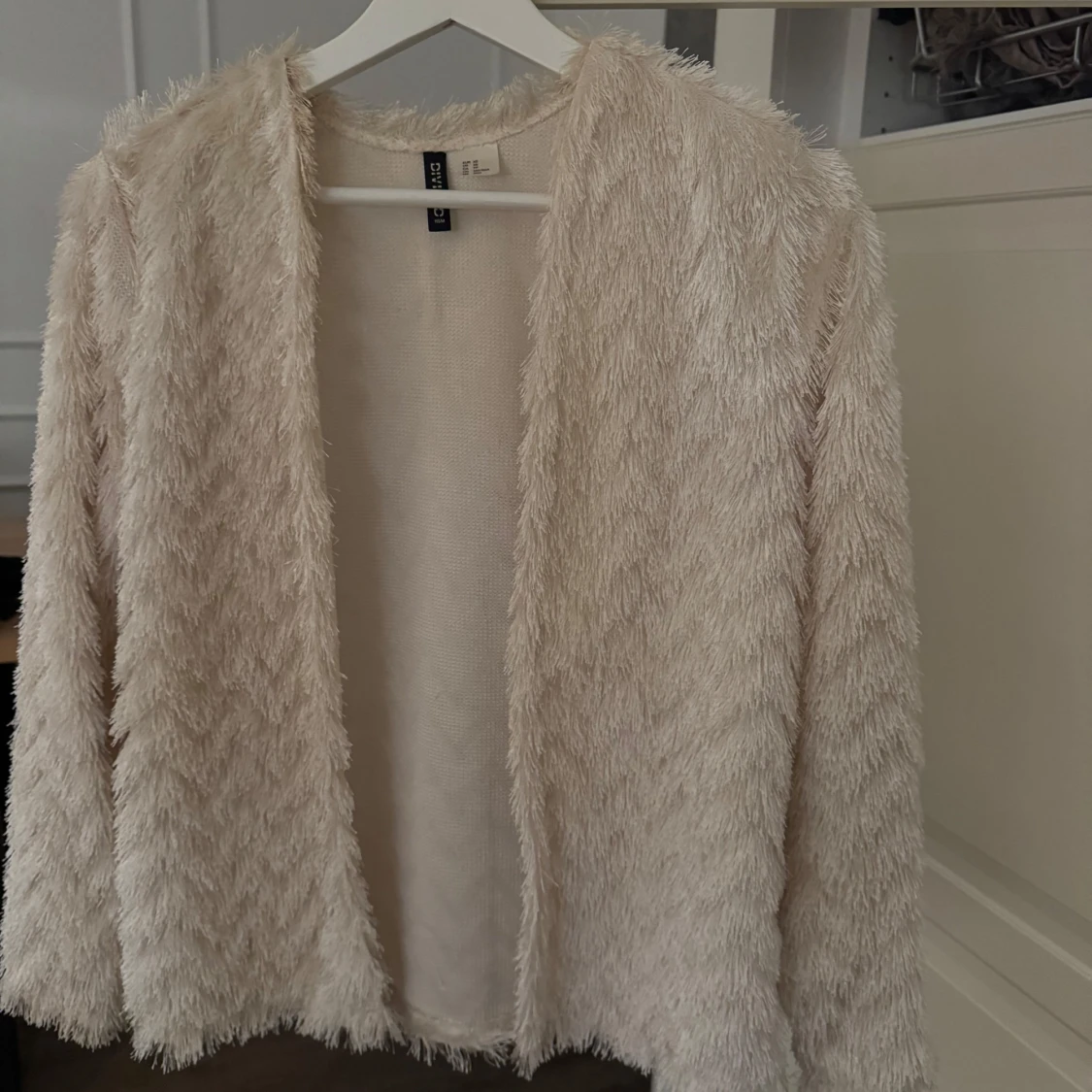 Beige fransigjacka/kofta från H&M