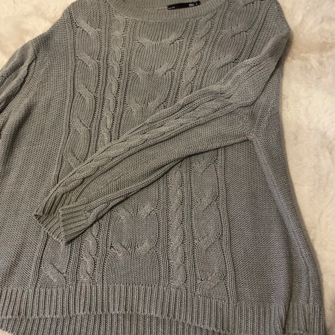 Grå stickad tröja från 157 - 90