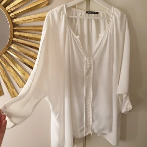 Blus - Använd en gång 