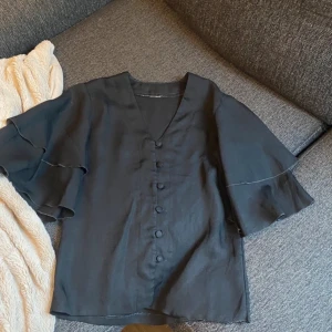 Kortärmad blus  - Nyskick 