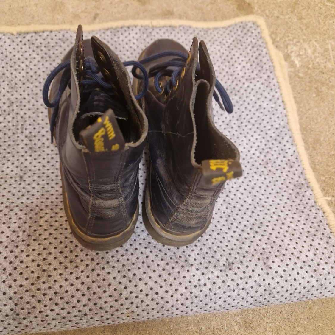 Ett par blåa stövlar - 91