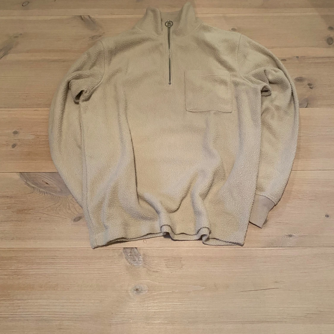 Beige fleece tröja med dragkedja