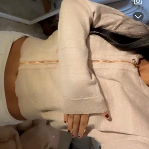 Rosa glittrig tröja f - Kommer inte till användning 