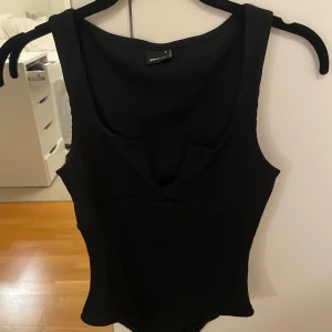 Svart body - Body från Gina Tricot