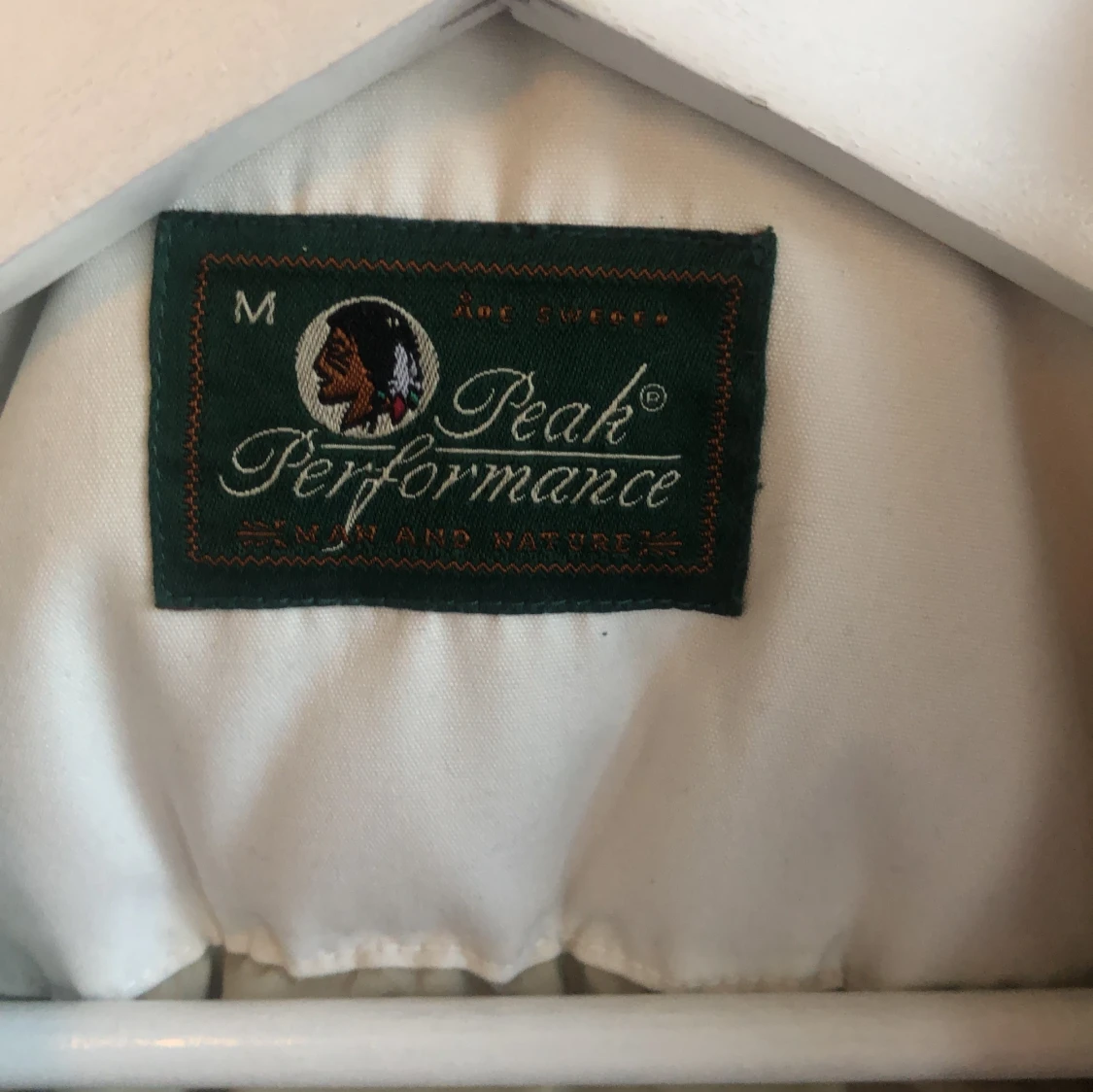 Vit dunjacka från Peak Performance - 90