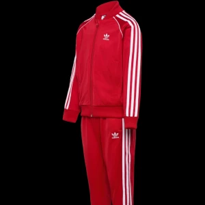 Röd tracksuit från adidas storlek XL - Snygg tracksuit från adidas i storlek XL, helt ny i princip, knappt använd. 