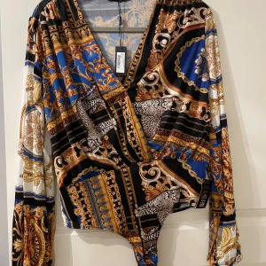 Oanvänd body  - Oanvänd body från Nelly. 