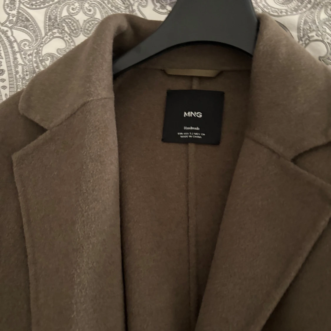 Brun kappa från MNG - 90