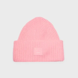 Acne mössa - Rosa acne mössa, väldigt bra skick! Kan tönka mig att byta mot en svart eller sälja till bra pris💗skriv för egna bilder!