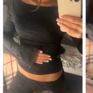 Svart topp  - Svart topp men slits lång ut på handen. Går att använda off shoulder (visat på bilden). Från gina helt slutsåld. (tjockare än derss soft tuch )
