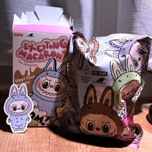 Exciting Macaron The Monsters Labubu - Sea Salt Coconut Labubu Macaron from Pop Mart. Brand new & unopened bag, still in original blind bag  packaging. The box has been opened (not the bag) to check for the secret figure.  Bought from Popmart’s official website & can show you the receipt If you want proof. 