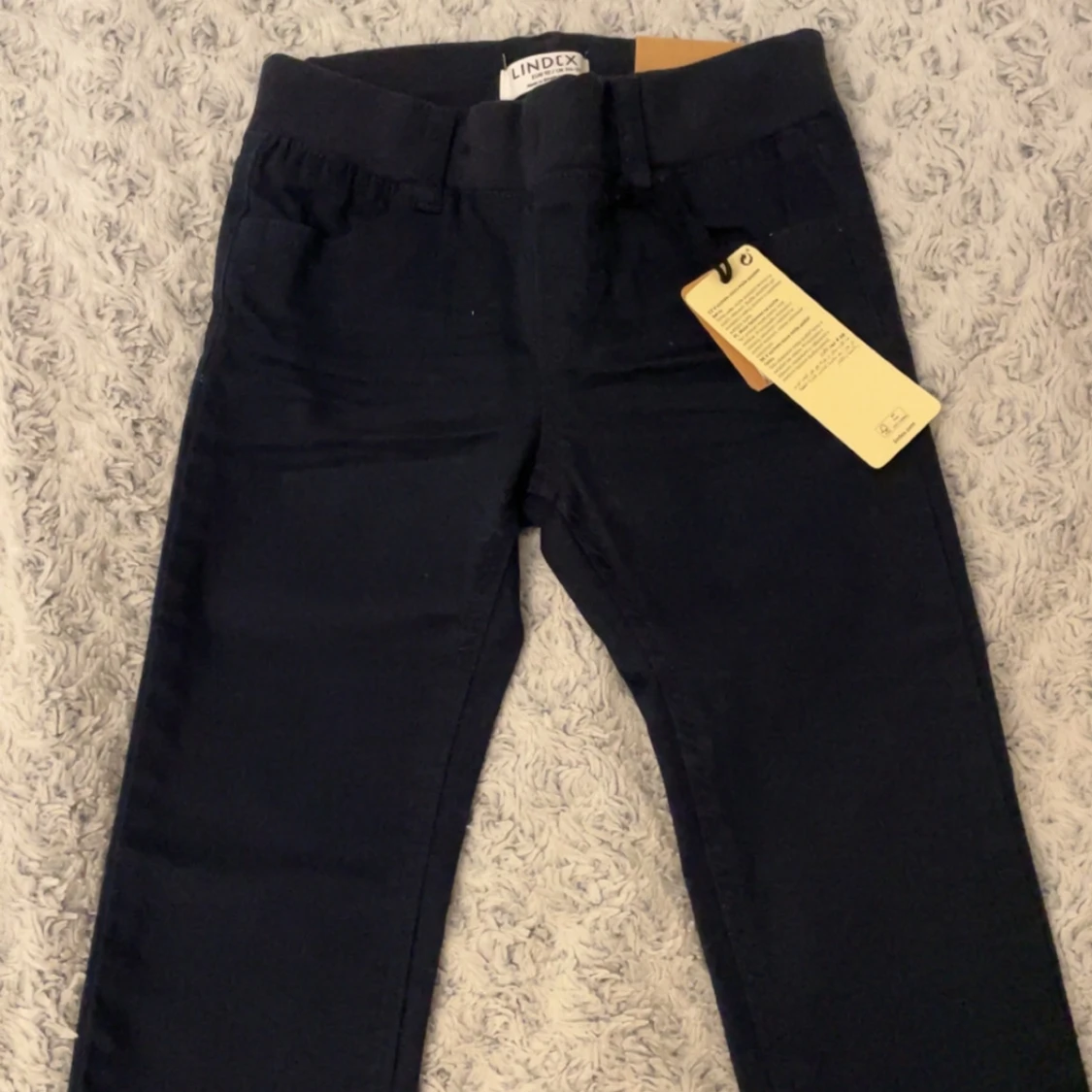 Mörkblå byxor från Lindex - 1