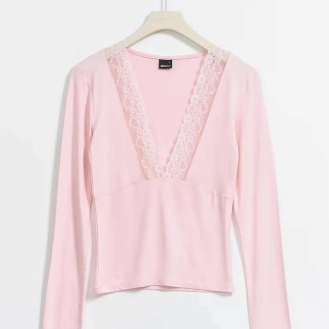 Rosa långärmad topp med spetsdetaljer - 1