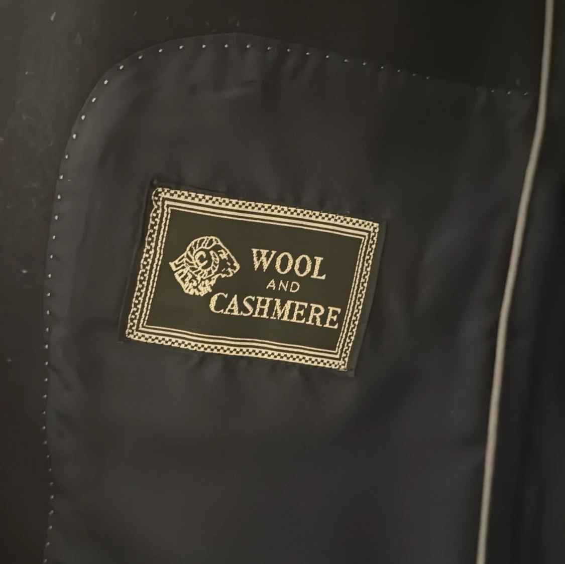 Mörkblå kappa från Riley - 2