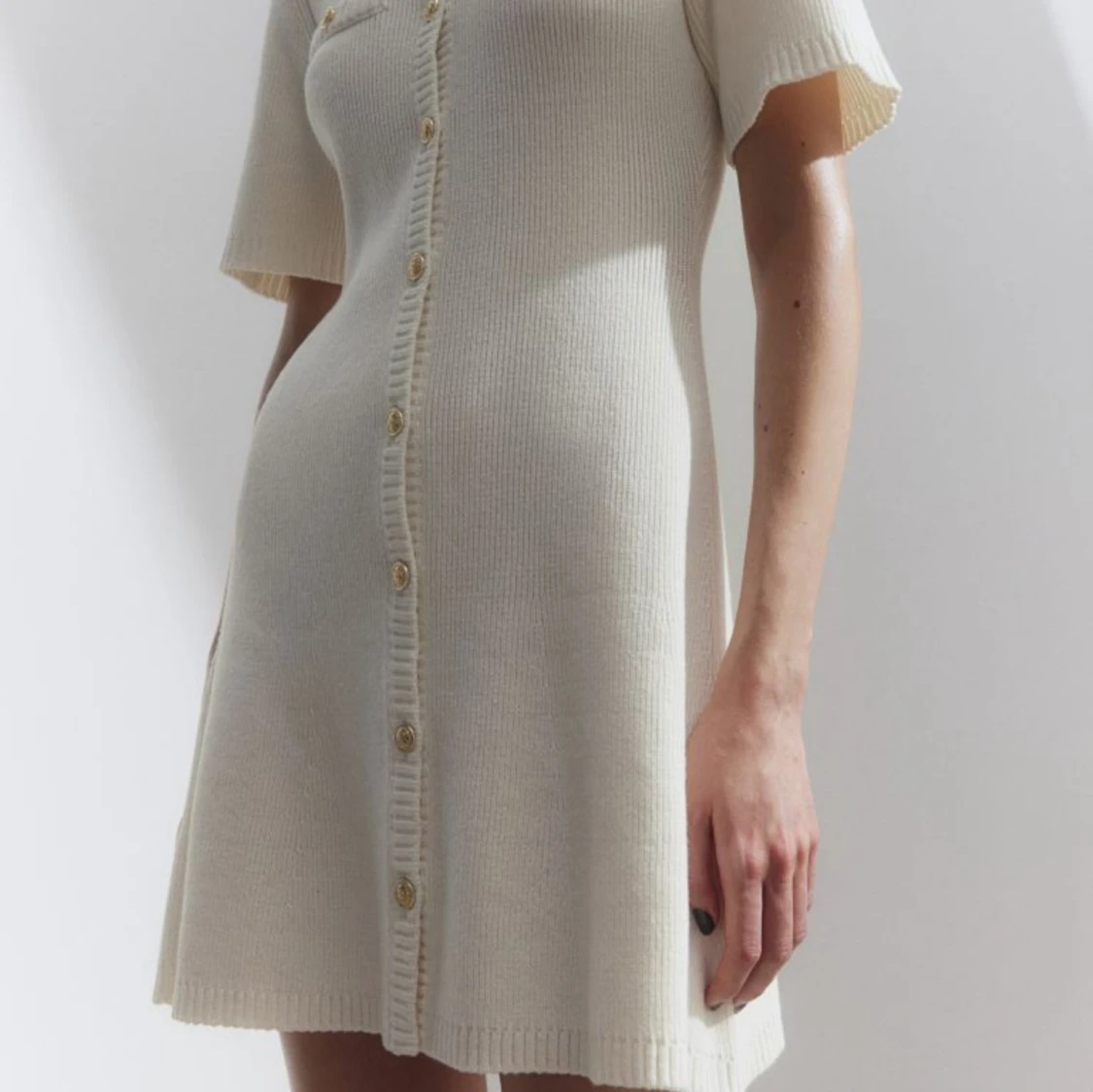 Kort stickad klänning  - 91