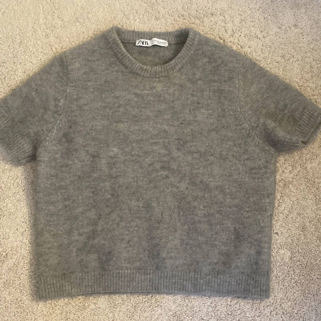 Kortärmad stickad tröja från zara - 90