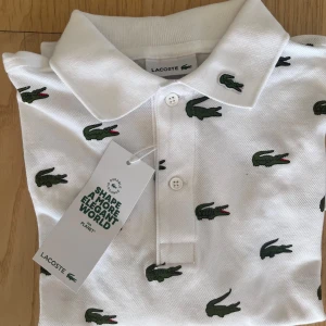 Snygg Lacoste pike - Helt oanvänd skick 10/10