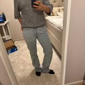 light blue jeans - light blue jeans, midrise. straight. they are a little long for me and I am 1.58