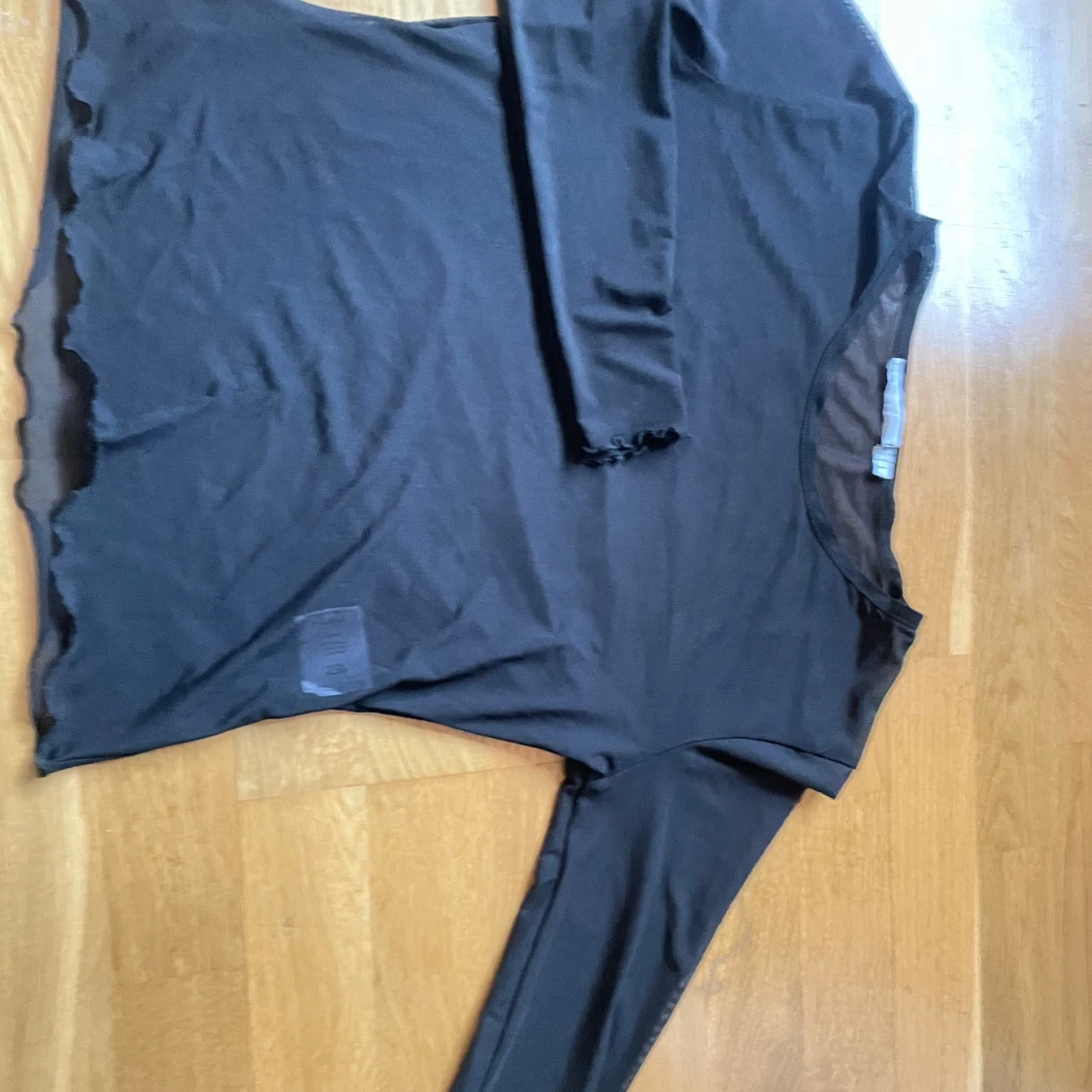 Svart långärmad genomskinlig topp