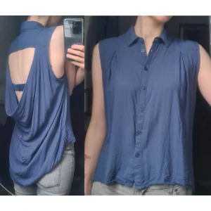 Skjortlinne med öppen rygg M - Fint skick, 100% viskos. Passar nog S-L pga modellen. Lite blekt på axeln. Vidd: 51-59, längd fram: 56, längd mitt bak: 84