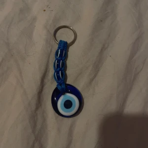 Evil Eye Nyckelring - sparsamt använd 